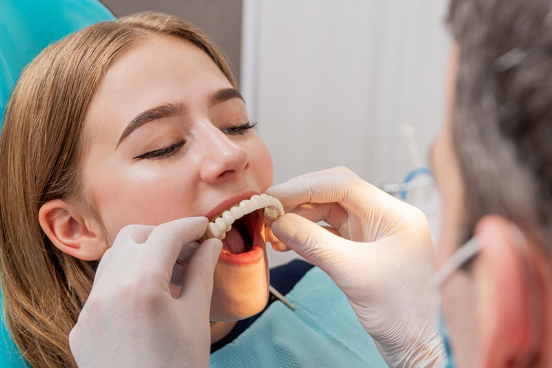 a dental patient being fitted for full mouth dental implant restorations.